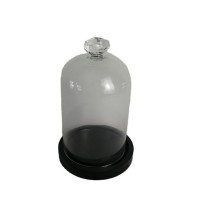 glass home decor of transparent glass dome with black wooden base and glass flower on top